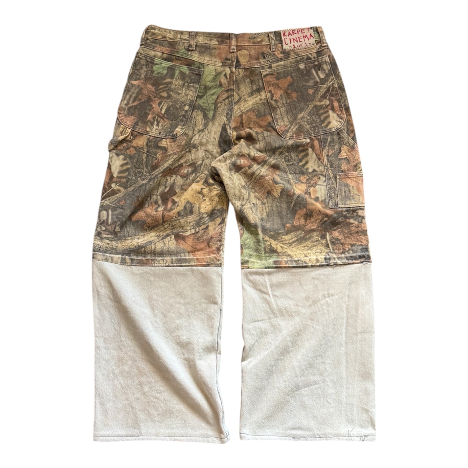 " half & half" camo jeans